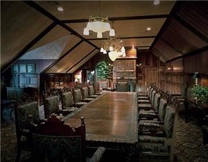 Governor's Board Room, Big Cedar Lodge, Ridgedale — This stately conference room with its’ dark pine library paneling and carved woodwork, is dominated by a carved wooden conference table with oversized matching chairs. It has a massive limestone fireplace and a corner bar. This meeting room is perfect for an executive function or meetings for twelve people. The Governor’s Board Room is located on the top floor of the Valley View Lodge.