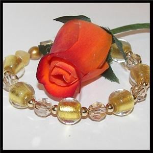 Ruby Leif Accessories LLC, Sussex — Swarovski crystals, gold foil-lined glass, rolled gold, yellow jade, carnelian, freshwater pearl - "Golden Love", one-of-a-kind.