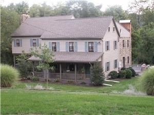 Blair Mountain Bed & Breakfast, Dillsburg — A circa 1767's renovated farmhouse with 6 acres with a wooded view and plenty of nostalgia.  Can accommodate up to 75 people outside and inside using 2 porches, decks, 2 dining rooms and a large common room.  There are 4 rooms for overnight accommodations with full breakfast provided, 24/7 service counter area & plenty of amenities. We want to be your "Home Away from Home"!  Call 717-571-9342.