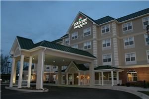 Country Inn & Suites By Carlson, Baltimore N, MD, Rosedale — This new hotel has a central location to everything Baltimore. Located 8 miles Northeast of Baltimore, minutes from Lockheed Martin, SAIC, Black & Decker and Johns Hopkins Medical Center.  A short ride away is Baltimore Inner Harbor, The National Aquarium, Oriole Park at Camden Yards, Ripken Stadium and Maryland's premier shopping at White Marsh Mall.  Hotel is conveniently located near Interstates 95, 695, 895 and the intersection of Rossville Blvd and Pulaski Highway.  Only 17.3 miles from the Baltimore Washington International Airport and 5 miles from Martin State Airport.  Martin State Airport is a joint civil military Airport and home to Lockheed Martin and Maryland National Guard 175th unit.  In addition, the MARC Train, Penn Station has service to Washington DC, Baltimore Washington International, Aberdeen, Edgewood and Bowie.