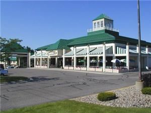 Green Mill Restaurant at The Best Western Kelly Inn, Minneapolis — Green Mill Restaurant and bar is conveniently located at the intersection of highway 55 and interstate 494. Our Plymouth location offers the advantage of being attached to the Kelly Inn Best Western Hotel and the Plymouth Playhouse Theater. Our rooms accommodate groups from 20-250 and can be set up in a variety of styles. Our facility is perfect for: *Corporate meetings & events *Banquets *Weddings *Rehearsal Dinners *Bridal and Baby Showers *Birthday Parties Our Sunset room and patio room combined can accommodate 250 people with a bank of windows overlooking our beautiful patio area which provides ample outdoor space for guests. Our catering department can provide buffet or plated meals for breakfast, lunch or dinner. We can also provide a variety of appetizers, breaks and snacks. Our experienced chef would be delighted to create a custom menu to suit any need.