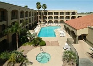 Clarion Suites, Yuma — Our spacious One-Bedroom Suites offer the luxury of having 1-King or 2-Queen beds in the Bedroom with a separate Living Room area.  

For your convenience, we have equipped each guest room with a coffee maker, clock radio, hairdryer, two color-remote televisions,refrigerator, microwave, and supply of toiletries. We also offer complimentary HS Internet Access, local calls, fax receiving, airport shuttle service to Yuma International Airport/MCAS, and shuttle service & membership use of the World gym.  

The Clarion Suites is conveniently located 2-miles away from the noise & traffic of I-8 and within a 5-mile radius to everything in the heart of Yuma to include: Yuma Civic & Convention Center, Cocapah Casino, Desert Hills Golf Course, Historic Downtown Yuma, Hospital, MCAS, Paradise Casino, various Corporate, Government & Medial Agencies, Shopping and a wide variety of Restaurants.