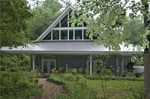 The Preston House, Mentone Mountain Retreat, Mentone — The Preston House adjacent to the chapel is and unequaled facility of grace and charm. The Preston House with its thirty-foot open beam ceiling, mountain stone fireplace, immaculate catering kitchen and a two thousand square foot wrap around porch can accommodate up to eighty guests. This is an excellent location for seminars, group meetings, and special gatherings. A baby grand piano and sound system is included.