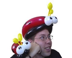 Balloon Art by Joey D, Albany — A ladybug braclet and hat, with spots and everything.  Makes grown women say "Awwww.... isn't that adorable"