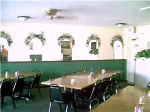 Banquet Room, Zorba's Restaurant & Pizzeria, Debary — Private Banquet Room with beautifully finished hard oak tabletops. Tables can be rearranged to seat as many guests at a table as you wish. Ceiling fan which YOU control keeps everyone comfortable!