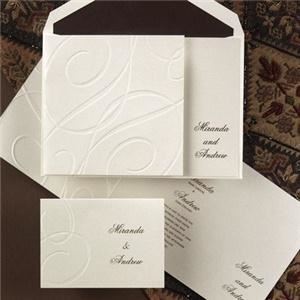 Simply Beautiful, Baton Rouge — Shimmering Swirls 
Make a statement to your guests with these shimmering ecru invitations. The front features an abundance of debossed swirls with your names featured at the right. Open it up to all of your invitation wording in your choice of ink color and lettering style. All ink colors will be printed flat.