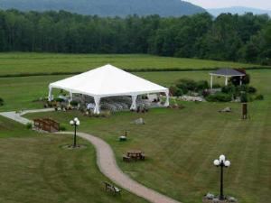 Outside - 20 Acres, Celebrations Banquet Facility & Catering, Ithaca — Celebrations ceremony site offering: gazebo, cobblestone stream, step bridges, 40' x 40' frame tent and 2300 s.f. flagstone patio.  We have 20 acres to use for large events, volleyball, pinics and more.