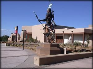 Performance Circle, Museum Of Indian Arts & Culture, Santa Fe — Craig Dan Goseyun's Apache Mountain Spirit Dancer presides over the Performance Circle at the entrance to the Museum of Indian Arts & Culture.
