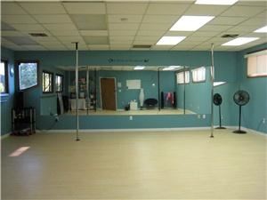 Fitness Dance Studio, Orlando — 950 sq ft of open floor space with wood floors and mirrors. We have fold up tables and chairs. Restroom on property as well.