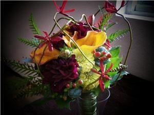 Enchanted Florist - Everett, Everett — Mini calla lilies, orchids, dahlias and zinnia are encircled with curly willow and lily grass.