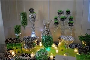 Candy Buffet Creators, Miami — We offer the ultimate in exclusive and sweet favors and desserts! Dream Wedding Designers will create delightful candy buffets for you and your guests to enjoy at any celebration or event that you may have! Candy buffets are the newest and hottest trend and are a creative way to brighten up any occasion. All of our buffets include scoops, jars, , favor bags, accessories, and a glass-framed announcement encouraging your guests to enjoy! Let us plan, design, and create the candy buffet of your dreams.