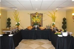 Elegant Memories, Greenwell Springs — Our Buffet is displayed with Black floorlength table drapes and Pewter and Silver serviceware.