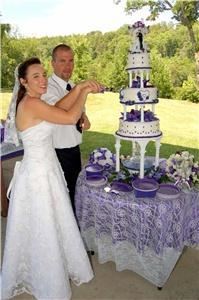Photographs by Kathy, Roanoke — This photo was taken at Claytor Lake during cake cutting ceremony.  It was such a beautiful, tall cake with a beautiful setting near the lake.