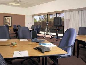 Flagstone Room, The Black Canyon Conference Center, Phoenix — Meeting room is equipped with ergonomic chairs, hard writing surfaces, natural lighting, audio visual built ins, and solid walls to create a distraction free learning environment. Our meeting rooms are designed and equipped with our guests comfort in mind.