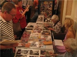 Mid Atlantic Nostalgia Convention, Hunt Valley — Fans collect autographs from celebrities Lee Meriwether and Celeste Holm.