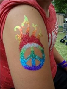 Cat's Fabulous Glitter Tattoos, North Hollywood — Cat's Fabulous Hand Drawn Glitter Tattoos - last 1 to 2 weeks, even in bath shower or pool. FDA approved. All the colors of the rainbow, custom designs and many samples to choose from. Make your next event unforgettable! Send your guests home with their own personal glittery work of art. Designs for the boys too -even black glitter!