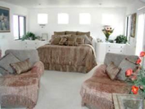 Entire Facility, Lion's Head Guest House, Jamul — The Athens Suite is the only suite with a fireplace and private fountain on its' balcony. This suite is luxurious in every way. From the gold plated italian bathroom fixtures to the tiled shower with dual shower heads and Jacuzzi tub. We know you'll enjoy staying in this beautiful room.