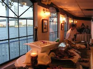 Entire Facility, The Liberty Belle, Philadelphia — Step inside and the Liberty Belle becomes a respite from the elements when cloudy and cool, a celebration when sunny and warm. The space is at once intimate and grand, a place to enjoy the company of friends or to share with others. Picture music, modern and upbeat.  Colorful flowers abound.