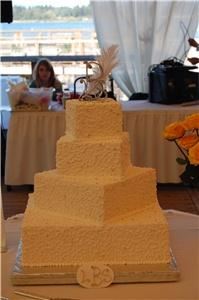 Always & Forever Custom Cakes, Bellingham — Four tier wedding cake.  Custom gumpaste initials logo.