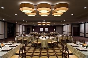 Capitol Room, Hyatt Regency Washington On Capitol Hill, Washington — This upscale location features custom made chandeliers and dark wood paneling which lends a warm, welcoming feel to this flexible 3,000 square foot space.  This room is ideal for up to 240 dinner guests or 300 in a reception setting.  Capitol Room can be divided into two separate, side-by-side rooms as well.
