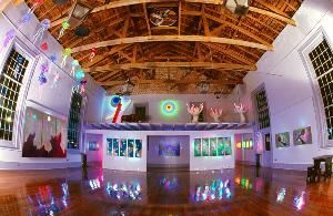 Venusian Gardens, New Orleans — Special Event Venue
- Art gallery and studio featuring luminous sculpture
- Conveniently located 5 blocks from the French Quarter
- 250 person capacity
- Ample parking for autos & motor coaches 
- Security for all events
- Full services including catering, entertainment and photography
- Art gallery tours, gift shop and neon glassblowing demonstrations