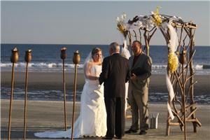 Lowcountry Wedding Minister - Myrtle Beach, Myrtle Beach — HOLIDAY ENGAGEMENT SEASON SPECIAL! Receive up to an $800 Cash Discount Off 2011 Wedding Packages Booked with Full Payment! Officiant only services, officiant & photography combination packages, elopement packages, and ceremony decor rentals also available. 

Call Dr. Clarke (Director of Wedding Services) for a no-obligation consultation.Relaxed, inspiring, and enjoyable, you will find in Dr. Clarke someone who will make your wedding ceremony both unique and memorable.