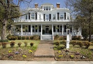 Pamlico House Bed & Breakfast, Washington — Located in Washington’s Historic District, the Pamlico House was built by St. Peter’s Episcopal Church as a rectory in 1906. The large Colonial Revival style frame house is just a short walk from downtown Washington.
 
The Bed & Breakfast porch, common areas and garden are available for weddings, social gatherings and celebrations. 

The Pamlico House is an ideal location for weddings, bridal and baby showers, birthdays, anniversaries as well as company holiday parties, club and business meetings.