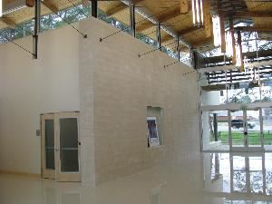 The Grand Foyer, OneREALTOR®Center, Tyler — The Grand Foyer offers natural lighting, outdoor spaces at each end and over 1900 sq ft of space for reception areas, dancing, cocktail hour or trade show exhibitions, art fairs, etc.  It is the most beautiful and flexible space in the facility!