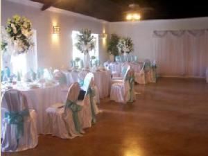 Indoor Area, Cole's Country, Cypress — Breathtaking Live Floral Centerpieces with Linens and Napkins in Coordinating Colors