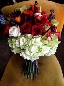 Sincerely Yours, Iowa Park — bridal bouquet made of various rich colors and textures.