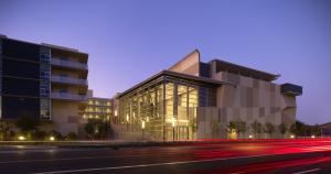 Oshman Family Jewish Community Center, Palo Alto — •	Our Cultural Arts Hall includes a complete 400 seat theatre with retractable seating, dressing rooms, lighting and sound booth. Various Floor configuration options when the seats are retracted.
•	The Freidenrich High Tech Conference Center is a state of the art audio- visual venue, with complimentary Wi-Fi, Ethernet and a connected open- air sheltered terrace on the fourth floor with views of the Santa Cruz Mountains.  This multi use space accommodates up to 250 people for Trade Shows, Product Launches, Corporate planning, sales, incentive and off site meetings, strategy sessions, annual events and receptions.