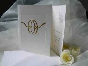 Classic Stationers, Victoria — Wedding invitation with detach reply post card,rings are foil stamped in gold; choice from over a 100 designs for the cover page.