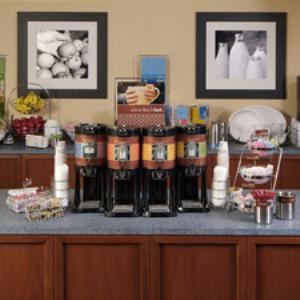 Conference room, Hampton Inn Youngstown-West I-80, Youngstown — Enjoy our new complimentary On the House™ hot breakfast. Menu items rotate and include such offerings as sausage patties, eggs and French toast sticks. 
A new blend of delicious coffee available 24 hours a day. 
If you are in a hurry, grab an On the Run Breakfast Bag™ at the front desk, complete with water, fruit, a muffin, and a cereal bar. Available Monday - Friday
