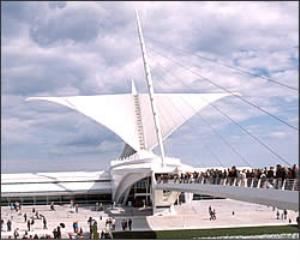 The Burke Brise Soleil is the moveable, wing-like sun screen that rests on top of the Museum’s vaulted, glass-enclosed reception hall. The Brise Soleil, unprecedented in American architecture, is the signature element of the Museum’s new 142,050-square-foot Quadracci Pavilion.

The Brise Soleil opens when the Museum opens and closes when the Museum closes at The Brise Soleil may stay open later some days due to special events. The “wings” also “flap” (close and open) each day at noon for visitors’ enjoyment. 

With fin size ranging in length from 26 to 105 feet, the Brise Soleil wingspan spreads 217 feet at its widest point, wider than a Boeing 747-400 airplane, and weighs 90 tons. The Burke Brise Soleil’s design is also unique among the moveable structures Calatrava has created in Europe.