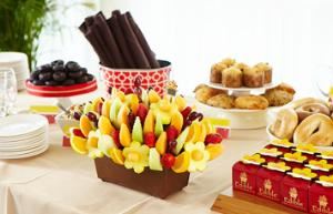Edible Arrangements Suwanee, Suwanee — The Edible Arrangements® Wedding Collection of custom fruit bouquets are the perfect marriage of taste and style. Whether you’re looking for centerpieces for wedding tables, wedding favor ideas, or even a sweet alternative to a traditional wedding cake, our Wedding Arrangements are the freshest way to say "I Do." Plus, our in-store Fruit Experts bring their think big ideas, event-planning perspective and nuptial know-how to the wedding table. We’ll help you turn your Dream Wedding into a reality with our wedding centerpiece ideas, unique wedding favors, beautiful (and delicious) wedding decorations and more. Our sweet, handmade table centerpieces are designed to be as beautiful as flowers in bloom, and as tasty as a decadent dessert.