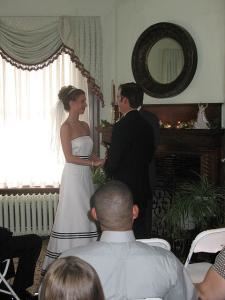 The Columbian Inn, The Columbian Inn, Columbia — wedding ceremony in front of Fireplace