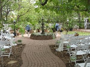 Back Yard Fountain Area & Patio, The Carpenter House, Plano — Heavily shaded & beautifully lighted in the evenings, the fountain area is a romantic location for wedding ceremonies & receptions, seating up to 150.  The slate patio can double as a dance floor & stage.