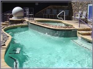 Party Pool, Chase Field - Home of the Arizona Diamondbacks, Phoenix — If you are looking to make a big splash this year, look no further than the Leslie's Pool Zone! The pool and spa sit nearly four feet above ground, allowing fans in the pool to enjoy an unobstructed view of the action on the field as well as additional areas to view the game. The Diamondbacks incorporated the use of natural stone finishes, including canterra and flagstone to give the pool a feel of an Arizona backyard. The Pool Zone also features a private bar area, plasma television and plush patio seating.