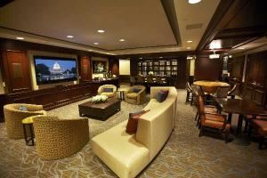 Member & Media Lounge, The City Club of Washington, Washington — Watch your favorite sports team or go down memory lane by watching your wedding slide show