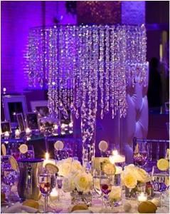 Enchanted Vizions, Houston — Chandelier Vase Centerpiece. Inside trumphet vase can be customized with rocks, flowers, water pearls, submersible lights. etc