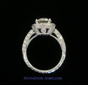 J. Rothstein & Co., Beverly Hills — Beautiful and Romantic diamond engagement ring with halo, crown, and hand-engraved band full of pave' diamonds. 2 carat center diamond. Retail priced at $36,000; our client had us make it for him for only $18,000. Smaller sizes are available.