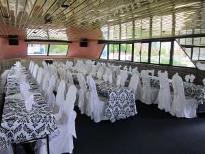 Entire Facility, Yankee Lady Yacht Charters, Toronto — this is the forward end of the main deck/dining room...this shot is from a bat mitzvah.  Chair covers available in many different options.