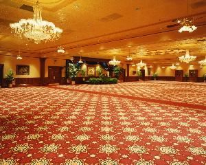 The Presidential Ballroom, The Ballroom at Church Street, Orlando — The entire Ballroom can fit upto 600 people for a sit down banquet.  The ceiling stained glass window, crystal chandeliers and authentic tin ceilings make this the perfect setting for an elegant dinner; awards banquet; or large corporate breakfast or luncheon.