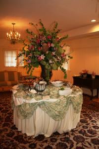 Batik Room, Gramercy Mansion Bed & Breakfast, Stevenson — The Batik Room boasts hardwood floors, a chandelier, and antique furnishings, access to the outdoor courtyard from French doors and easy access to handicap-accessible restrooms.  Ideal for small meetings or retreats.