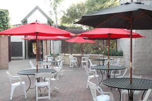 Sarofim Court, Houston Zoo, Houston — This intimate spot offers you the benefits of a private space in the heart of the bustling Houston Zoo. Tables come equipped with large umbrellas to provide shade for your guests during the day, and at night you can look up at the stars as you enjoy the gentle sounds of a nearby fountain.
Decorative paving, convenient food service, and beautifully renovated bathrooms contribute to a festive patio atmosphere and make this the perfect spot for a small outdoor picnic or party.