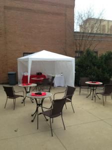 Custom Cigar Services, Painesville — This is a basic setup that we displayed at a recent show.  The weather was threatening all day but we were able to put up something functionable.  We served cigars and ice cream out of the lounge that night.