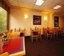 Comfort Inn & Suites near the University of Maryland, College Park — Breakfast Area over looking Anacoatia Tributary Trail System