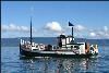 Alaska's Ridgewood Wilderness Lodge, Homer — Transportation to Halibut Cove: 
Round trip transportation is provided by Kachemak Bay Ferry.  Check in at Central Charters (907) 235-7847, 4241 Homer Spit Rd., at 11:00 a.m. for your ticket.  The ferry leaves the Homer harbor at 12:00 o’clock sharp.  Arrival in Halibut Cove is at 1:15 where you will be met by lodge staff.  You will have the opportunity to buy lunch at the Saltry Restaurant and enjoy Halibut Cove’s extensive boardwalks and art galleries; or go directly to the Lodge for lunch and relaxation.  You will have the opportunity to go to the Saltry or walk the boardwalks at a later time.  Departure from Halibut Cove will be at 10:00 a.m., arriving in Homer at 11:00 a.m.