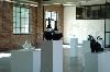 The East Gallery, Third Degree Glass Factory, Saint Louis — Although the pedestals of glass art are in the center here, they are often moved to the edges of the East Gallery during events.