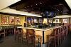 Crowne Plaza Dulles Airport, Herndon — It won’t take you long to discover that Houlihan’s is not your ordinary hotel restaurant and bar! As soon as you walk in the door of our Herndon, VA restaurant and bar, you’ll start to feel a little less buttoned-up and breathe a little easier. The atmosphere at Houlihan’s could only be described as fun-loving and eclectic, with a creative menu and unique drinks to match. Enjoy the freshest ingredients for a unique culinary experience offering an extensive selection of dining and drink specialties that are inspired by fare from around the globe. You’ll also be able to cheer for your favorite team as you catch the game on one of our four HD televisions.
